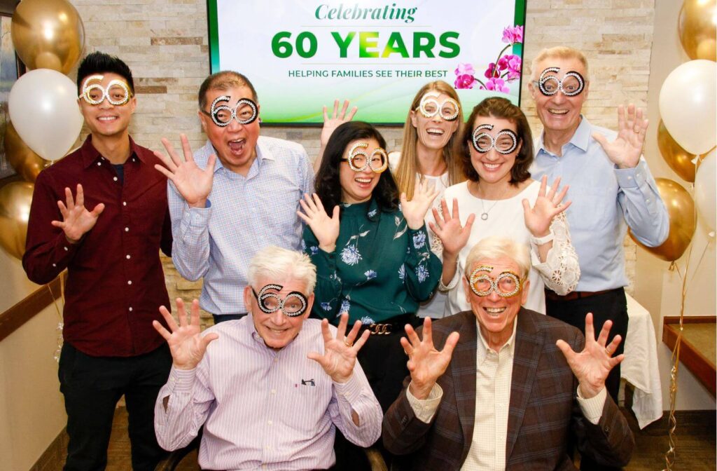 Queensway Optometric Centre eye care team celebrating 60 years